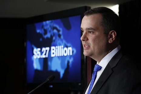 Canada's Industry Minister James Moore speaks during a news conference in Ottawa February 19, 2014. REUTERS/Chris Wattie Canada's Industry Minister James Moore speaks during a news conference in Ottawa February 19, 2014. REUTERS/Chris Wattie