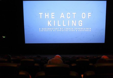 People watch "The Act of Killing" movie in Jakarta, February 6, 2013. REUTERS/Beawiharta People watch "The Act of Killing" movie in Jakarta, February 6, 2013. REUTERS/Beawiharta