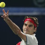 Roger Federer of Switzerland serves to Lukas Rosol of the Czech Republic during their men's singles match at the ATP Dubai Tennis Championsh Roger Federer of Switzerland serves to Lukas Rosol of the Czech Republic during their men's singles match at the ATP Dubai Tennis Championsh