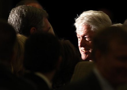 Former President Bill Clinton shakes hands with the crowd as he joins U.S. Democratic Senate candidate Alison Lundergan Grimes (not pictured Former President Bill Clinton shakes hands with the crowd as he joins U.S. Democratic Senate candidate Alison Lundergan Grimes (not pictured