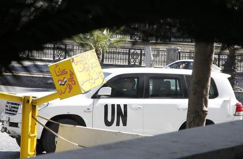A U.N. vehicle returns to a hotel where experts from the Organisation for the Prohibition of Chemical Weapons (OPCW) are staying, in Damascu A U.N. vehicle returns to a hotel where experts from the Organisation for the Prohibition of Chemical Weapons (OPCW) are staying, in Damascu