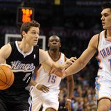 Jan 19, 2014; Oklahoma City, OK, USA; Sacramento Kings point guard Jimmer Fredette (7) dribbles the ball as Oklahoma City Thunder center Ste Jan 19, 2014; Oklahoma City, OK, USA; Sacramento Kings point guard Jimmer Fredette (7) dribbles the ball as Oklahoma City Thunder center Ste