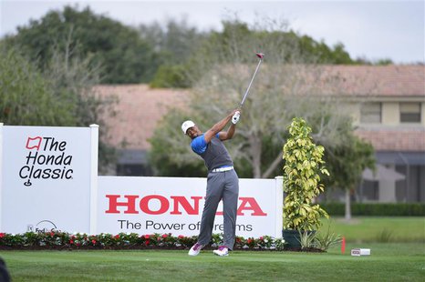 Feb 27, 2014; Palm Beach Gardens, FL, USA; Tiger Woods on the 12th tee at PGA National GC Champion Course. Mandatory Credit: Bob Donnan-USA Feb 27, 2014; Palm Beach Gardens, FL, USA; Tiger Woods on the 12th tee at PGA National GC Champion Course. Mandatory Credit: Bob Donnan-USA
