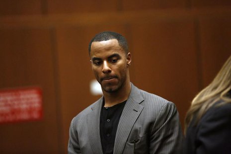 Former professional football player Darren Sharper appears for his arraignment at the Clara Shortridge Foltz Criminal Justice Center in Los Former professional football player Darren Sharper appears for his arraignment at the Clara Shortridge Foltz Criminal Justice Center in Los