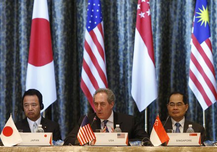 U.S. Trade Representative Michael Froman (C) speaks next to Japan's Economics Minister Akira Amari (L) and Singapore's Trade Minister Lim Hn U.S. Trade Representative Michael Froman (C) speaks next to Japan's Economics Minister Akira Amari (L) and Singapore's Trade Minister Lim Hn