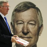 Former Manchester United manager Alex Ferguson poses with his new autobiography before a book signing at a supermarket in Manchester, northe Former Manchester United manager Alex Ferguson poses with his new autobiography before a book signing at a supermarket in Manchester, northe