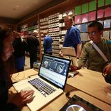 Customers test out Apple products inside Berlin's first Apple store during its grand opening May 3, 2013. REUTERS/Pawel Kopczynski Customers test out Apple products inside Berlin's first Apple store during its grand opening May 3, 2013. REUTERS/Pawel Kopczynski