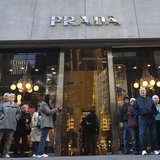 People stand outside a Prada store on 5th Ave during Black Friday Sales in New York November 29, 2013. REUTERS/Carlo Allegri People stand outside a Prada store on 5th Ave during Black Friday Sales in New York November 29, 2013. REUTERS/Carlo Allegri