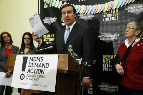 U.S. Senator Chris Murphy (D-CT) (C) speaks at a news conference held by the groups Mayors Against Illegal Guns and Moms Demand Action for G U.S. Senator Chris Murphy (D-CT) (C) speaks at a news conference held by the groups Mayors Against Illegal Guns and Moms Demand Action for G