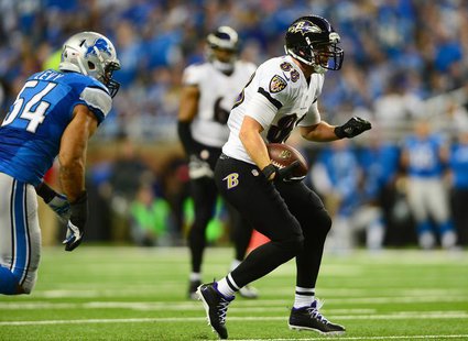 Dec 16, 2013; Detroit, MI, USA; Baltimore Ravens tight end Dennis Pitta (88) looks to get vertical after making a catch during the second qu Dec 16, 2013; Detroit, MI, USA; Baltimore Ravens tight end Dennis Pitta (88) looks to get vertical after making a catch during the second qu