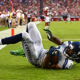 Oct 17, 2013; Phoenix, AZ, USA; Seattle Seahawks wide receiver Sidney Rice (18) catches a touchdown pass in the first quarter against the Ar Oct 17, 2013; Phoenix, AZ, USA; Seattle Seahawks wide receiver Sidney Rice (18) catches a touchdown pass in the first quarter against the Ar