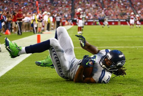 Oct 17, 2013; Phoenix, AZ, USA; Seattle Seahawks wide receiver Sidney Rice (18) catches a touchdown pass in the first quarter against the Ar Oct 17, 2013; Phoenix, AZ, USA; Seattle Seahawks wide receiver Sidney Rice (18) catches a touchdown pass in the first quarter against the Ar