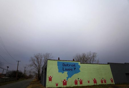 A mural that reads "Detroit Lives!" is displayed on the side of a building in Detroit, Michigan December 3, 2013. REUTERS/Joshua Lott A mural that reads "Detroit Lives!" is displayed on the side of a building in Detroit, Michigan December 3, 2013. REUTERS/Joshua Lott