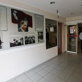 Students walk past photographs of modern Turkey's secular founder Mustafa Kemal Ataturk hanging on a wall at the entrance of FEM University Students walk past photographs of modern Turkey's secular founder Mustafa Kemal Ataturk hanging on a wall at the entrance of FEM University