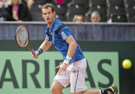 Feb 2, 2014; San Diego, CA, USA; Andy Murray (GBR) in action against Sam Querrey (USA) in the USA vs GBR Davis Cup tie at Petco Park. Mandat Feb 2, 2014; San Diego, CA, USA; Andy Murray (GBR) in action against Sam Querrey (USA) in the USA vs GBR Davis Cup tie at Petco Park. Mandat