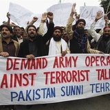 Supporters of Pakistan's religious political party Sunni Tehreek shout slogans as they demand a military operation against Taliban, in Pakis Supporters of Pakistan's religious political party Sunni Tehreek shout slogans as they demand a military operation against Taliban, in Pakis