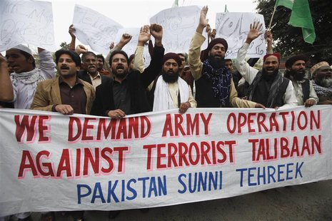 Supporters of Pakistan's religious political party Sunni Tehreek shout slogans as they demand a military operation against Taliban, in Pakis Supporters of Pakistan's religious political party Sunni Tehreek shout slogans as they demand a military operation against Taliban, in Pakis