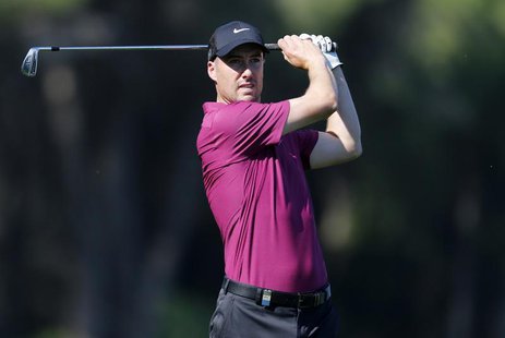 Ross Fisher of Britain plays a shot on the sixth hole during the third round of the inaugural Turkish Airlines Open in the southwest city of Ross Fisher of Britain plays a shot on the sixth hole during the third round of the inaugural Turkish Airlines Open in the southwest city of