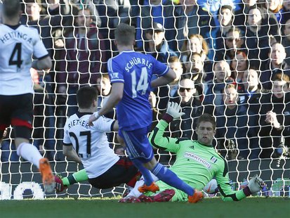 Chelsea's Andre Schurrle (C) scores a goal past Fulham's goalkeeper Maarten Stekelenburg (R) during their English Premier League soccer matc Chelsea's Andre Schurrle (C) scores a goal past Fulham's goalkeeper Maarten Stekelenburg (R) during their English Premier League soccer matc