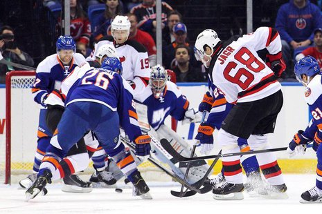 Mar 1, 2014; Uniondale, NY, USA; New Jersey Devils right wing Jaromir Jagr (68) scores a goal against New York Islanders goalie Evgeni Nabok Mar 1, 2014; Uniondale, NY, USA; New Jersey Devils right wing Jaromir Jagr (68) scores a goal against New York Islanders goalie Evgeni Nabok
