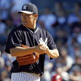 Mar 1, 2014; Tampa, FL, USA; New York Yankees pitcher Masahiro Tanaka (19) looks on during the sixth inning against the Philadelphia Phillie Mar 1, 2014; Tampa, FL, USA; New York Yankees pitcher Masahiro Tanaka (19) looks on during the sixth inning against the Philadelphia Phillie