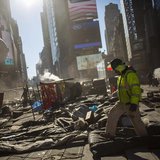 A worker walks while repairing the road at Times Square in New York December 13, 2013. REUTERS/Eric Thayer A worker walks while repairing the road at Times Square in New York December 13, 2013. REUTERS/Eric Thayer