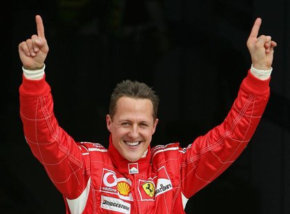 Ferrari Formula One driver Michael Schumacher of Germany celebrates after taking the pole position at the end of the qualifying session for Ferrari Formula One driver Michael Schumacher of Germany celebrates after taking the pole position at the end of the qualifying session for