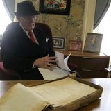Dudley Martin looks at handwritten manuscripts written by Robert Stroud at his home in Springfield, Missouri, February 12, 2014. REUTERS/Kev Dudley Martin looks at handwritten manuscripts written by Robert Stroud at his home in Springfield, Missouri, February 12, 2014. REUTERS/Kev