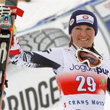Andrea Fischbacher of Austria celebrates winning the women's FIS Alpine Skiing World Cup Downhill race on her way to the podium in the Swiss Andrea Fischbacher of Austria celebrates winning the women's FIS Alpine Skiing World Cup Downhill race on her way to the podium in the Swiss