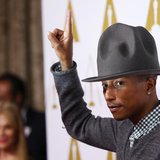 Rapper Pharrell Williams arrives at the 86th Academy Awards nominees luncheon in Beverly Hills, California February 10, 2014. REUTERS/Mario Rapper Pharrell Williams arrives at the 86th Academy Awards nominees luncheon in Beverly Hills, California February 10, 2014. REUTERS/Mario