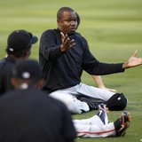 San Francisco Giants Guillermo Mota talks with teammates while he stretches during workouts ahead of Game 3 of Major League Baseball's World San Francisco Giants Guillermo Mota talks with teammates while he stretches during workouts ahead of Game 3 of Major League Baseball's World