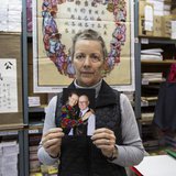 Karen Short, wife of Australian missionary John Short, poses with a photo of her husband inside the Christian Book Room in Hong Kong Februar Karen Short, wife of Australian missionary John Short, poses with a photo of her husband inside the Christian Book Room in Hong Kong Februar