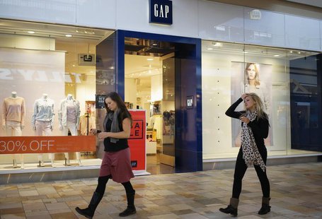 Passers-by walk next to a Gap store in Broomfield, Colorado February 27, 2014. REUTERS/Rick Wilking Passers-by walk next to a Gap store in Broomfield, Colorado February 27, 2014. REUTERS/Rick Wilking