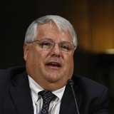 Apple's CFO Peter Oppenheimer appears before a Senate homeland security and governmental affairs investigations subcommittee hearing on offs Apple's CFO Peter Oppenheimer appears before a Senate homeland security and governmental affairs investigations subcommittee hearing on offs