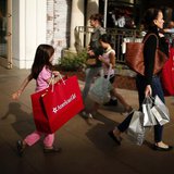 People shop at The Grove mall in Los Angeles November 26, 2013. REUTERS/Lucy Nicholson People shop at The Grove mall in Los Angeles November 26, 2013. REUTERS/Lucy Nicholson