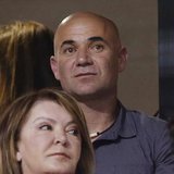 Former professional tennis player Andre Agassi attends the men's singles quarterfinal match between Rafael Nadal of Spain and Roger Federer Former professional tennis player Andre Agassi attends the men's singles quarterfinal match between Rafael Nadal of Spain and Roger Federer