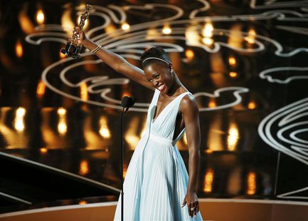 Lupita Nyong'o, best supporting actress winner for her role in "12 Years a Slave", speaks on stage at the 86th Academy Awards in Hollywood, Lupita Nyong'o, best supporting actress winner for her role in "12 Years a Slave", speaks on stage at the 86th Academy Awards in Hollywood,