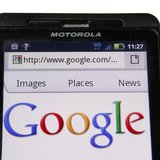 A Google homepage is displayed on a Motorola Droid phone in Washington August 15, 2011. REUTERS/Kevin Lamarque A Google homepage is displayed on a Motorola Droid phone in Washington August 15, 2011. REUTERS/Kevin Lamarque