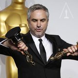 Alfonso Cuaron poses with the awards for best director and best film editing for "Gravity" at the 86th Academy Awards in Hollywood, Californ Alfonso Cuaron poses with the awards for best director and best film editing for "Gravity" at the 86th Academy Awards in Hollywood, Californ