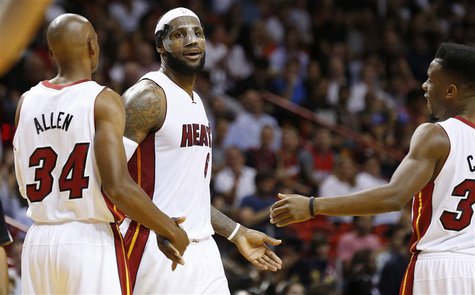 Mar 3, 2014; Miami, FL, USA; Miami Heat small forward LeBron James (6) is congratulated by Miami Heat shooting guard Ray Allen (34) and Miam Mar 3, 2014; Miami, FL, USA; Miami Heat small forward LeBron James (6) is congratulated by Miami Heat shooting guard Ray Allen (34) and Miam