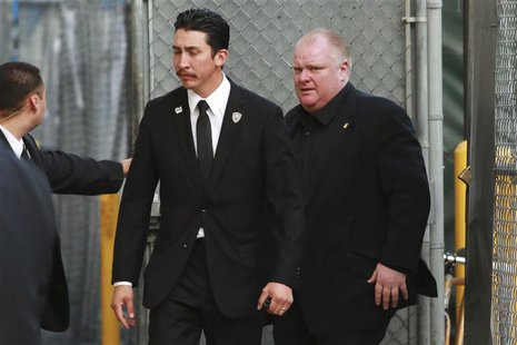 Embattled Toronto Mayor Rob Ford (R) arrives for an appearance on the "Jimmy Kimmel Live!" show in Hollywood, California March 3, 2014. REUT Embattled Toronto Mayor Rob Ford (R) arrives for an appearance on the "Jimmy Kimmel Live!" show in Hollywood, California March 3, 2014. REUT
