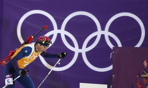 Norway's Ole Einar Bjoerndalen skis during the men's biathlon 4 x 7.5 km relay at the Sochi 2014 Winter Olympic Games February 22, 2014. REU Norway's Ole Einar Bjoerndalen skis during the men's biathlon 4 x 7.5 km relay at the Sochi 2014 Winter Olympic Games February 22, 2014. REU