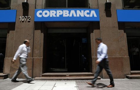 People walk in front of a CorpBanca branch office in downtown Santiago January 29, 2014. REUTERS/Ivan Alvarado People walk in front of a CorpBanca branch office in downtown Santiago January 29, 2014. REUTERS/Ivan Alvarado