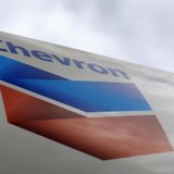 A Chevron gas station sign is pictured at one of their retain gas stations in Cardiff, California October 9, 2013. REUTERS/Mike Blake A Chevron gas station sign is pictured at one of their retain gas stations in Cardiff, California October 9, 2013. REUTERS/Mike Blake
