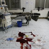 Blood is seen on a hospital floor in what activists say was shelling from forces loyal to President Bashar Al-Assad in Raqqa, eastern Syria Blood is seen on a hospital floor in what activists say was shelling from forces loyal to President Bashar Al-Assad in Raqqa, eastern Syria