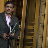 Conservative commentator and best-selling author, Dinesh D'Souza exits the Manhattan Federal Courthouse in New York, January 24, 2014. REUTE Conservative commentator and best-selling author, Dinesh D'Souza exits the Manhattan Federal Courthouse in New York, January 24, 2014. REUTE