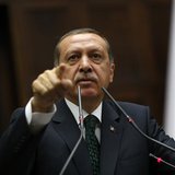 Turkey's Prime Minister Tayyip Erdogan addresses members of parliament from his ruling AK Party (AKP) during a meeting at the Turkish parlia Turkey's Prime Minister Tayyip Erdogan addresses members of parliament from his ruling AK Party (AKP) during a meeting at the Turkish parlia