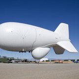 A Raytheon Joint Land Attack Cruise Missile Defense Elevated Netted Sensor System (JLENS) aerostat is pictured on the White Sands Missile Ra A Raytheon Joint Land Attack Cruise Missile Defense Elevated Netted Sensor System (JLENS) aerostat is pictured on the White Sands Missile Ra