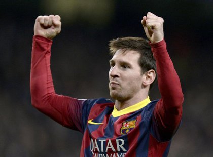 Barcelona's Lionel Messi celebrates after scoring a penalty against Manchester City during their Champions League round of 16 first leg socc Barcelona's Lionel Messi celebrates after scoring a penalty against Manchester City during their Champions League round of 16 first leg socc