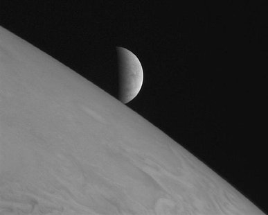 New Horizons took this image of the icy moon Europa rising above Jupiter's cloud tops after the spacecraft's closest approach to Jupiter. RE New Horizons took this image of the icy moon Europa rising above Jupiter's cloud tops after the spacecraft's closest approach to Jupiter. RE